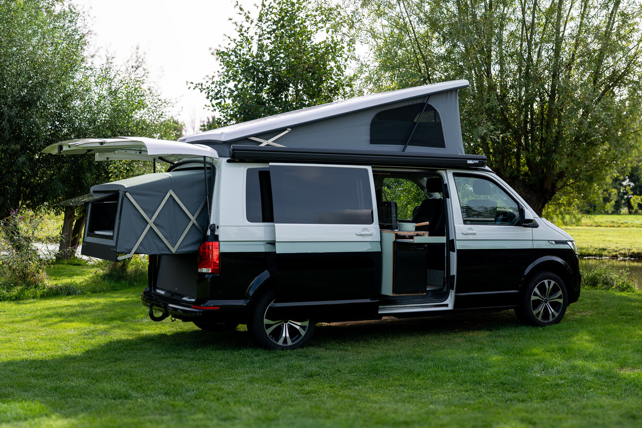 Compacte camper met vast bed: hefdak, vaste opbouw of slide-out vergeleken